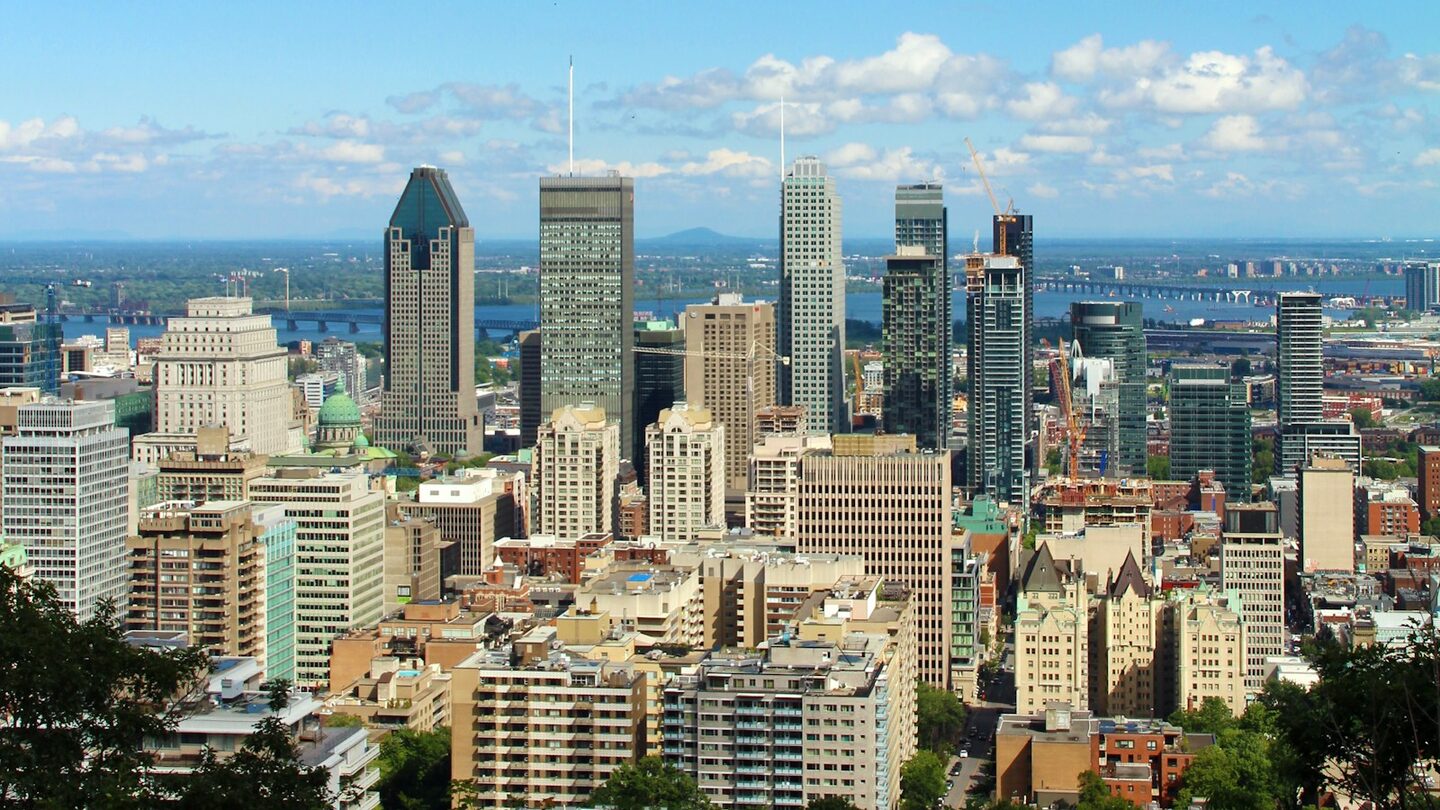 The downtown Montréal skyline seen from Mount Royal — the city where ePressario Publishing was founded